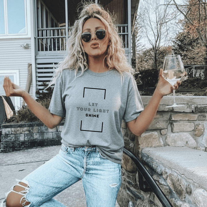 The Radiance Daily t-shirt with Let Your Light Shine message