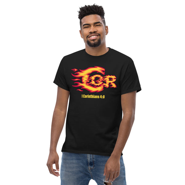 Flat lay of “1 Corinthians 4:8” Christian tee with fiery C graphic